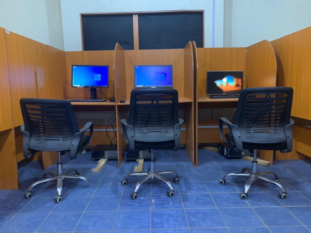 Students taking international exams in a modern facility